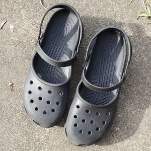 Black Mary Janes by Crocs